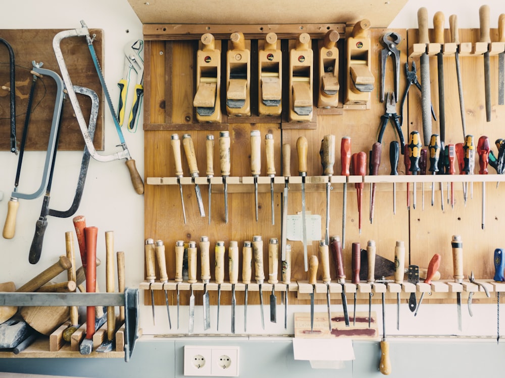 Hand tools organised on a workshop wall